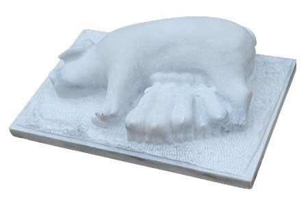 Stone carving of sow